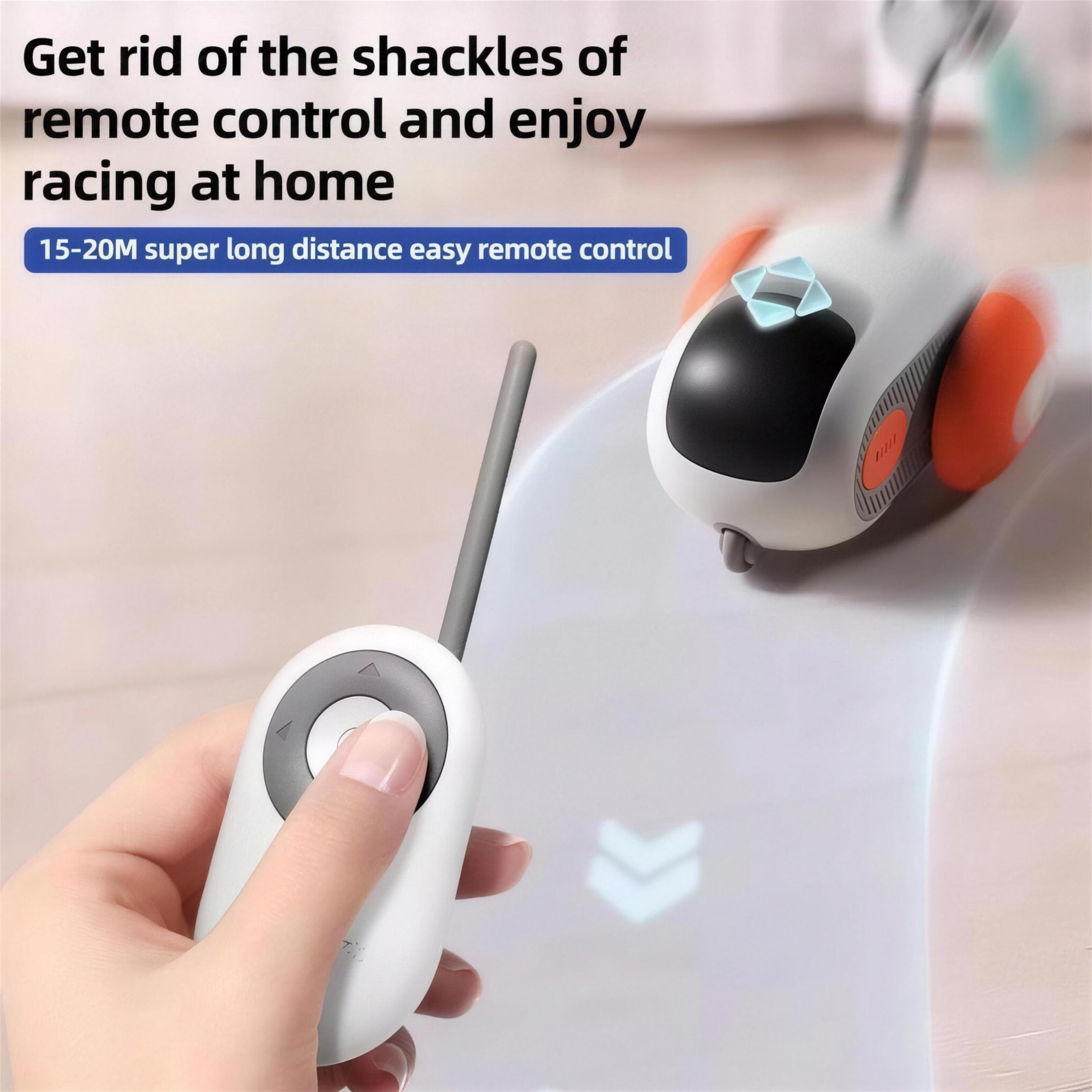 Hand holding the wireless remote while the Meowtix RC car speeds away